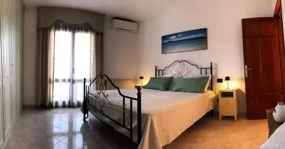 Letto o letti in una camera di B&B Casa Antonietta