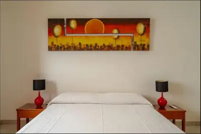Letto o letti in una camera di Tra blu e verde