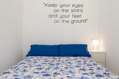 Letto o letti in una camera di Romantic Apartment with Terrace by Wonderful Italy