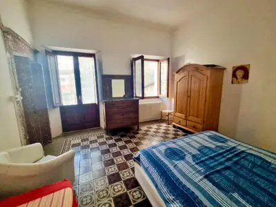 Letto o letti in una camera di Casa Manconi
