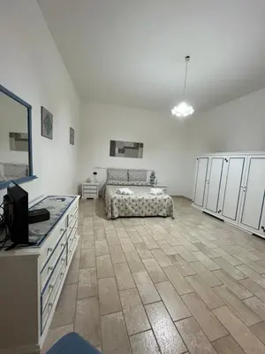 Letto o letti in una camera di Casa La Pavoncella