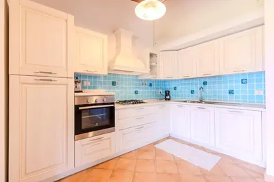 Cucina o angolo cottura di Villa Capo Coda Cavallo con Piscina