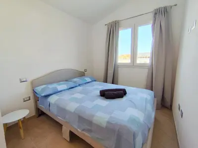 Letto o letti in una camera di Villa il borgo con piscina