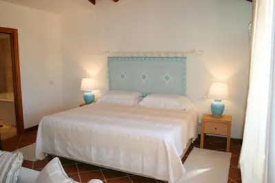 Letto o letti in una camera di Hotel Marana