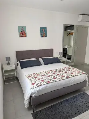 Letto o letti in una camera di LaRosaBeB