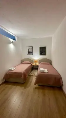 Letto o letti in una camera di Galvani Suites