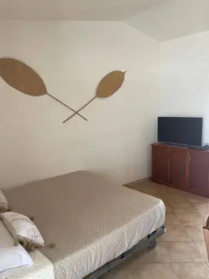 Letto o letti in una camera di Studio Boho by Propertize