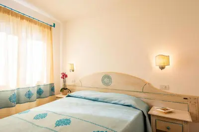 Letto o letti in una camera di Charming Baia Marina apartment