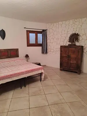 Letto o letti in una camera di Villa Minardi