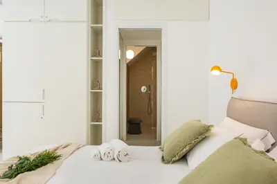 Letto o letti in una camera di Anita Rooms