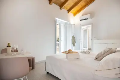 Letto o letti in una camera di Anita Rooms