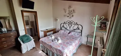 Letto o letti in una camera di Affittacamere Iole