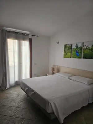 Letto o letti in una camera di FabHouse Olbia