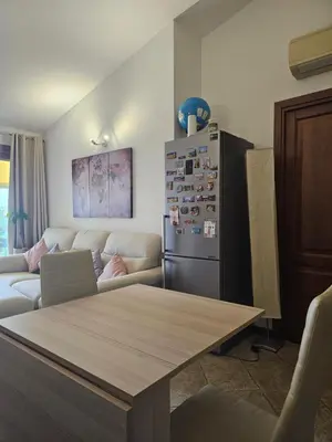 Area soggiorno di FabHouse Olbia
