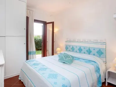 Letto o letti in una camera di Villa Briziola - Puntaldia - vista mare e giardino
