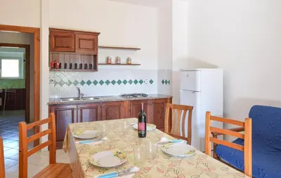 Cucina o angolo cottura di Appartamenti a Sa Serra di Orosei