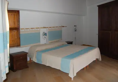 Letto o letti in una camera di Rifugio Di Galte