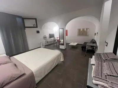 Letto o letti in una camera di Via Romana 1 camera con bagno