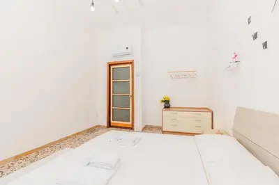 Letto o letti in una camera di Downtown View - AP Margherita -