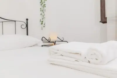 Letto o letti in una camera di Downtown View - AP Margherita -