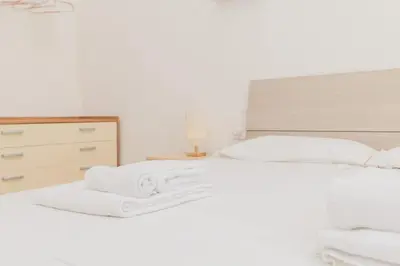 Letto o letti in una camera di Downtown View - AP Margherita -