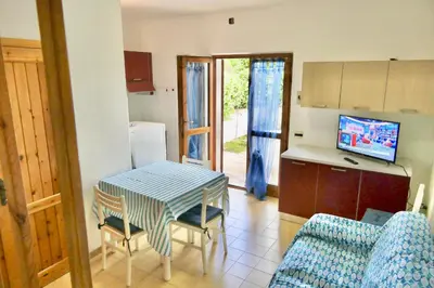 TV o dispositivi per l'intrattenimento presso ISS Travel - Domo Cytonia 2-bedrooms apartment with private fenced terrace