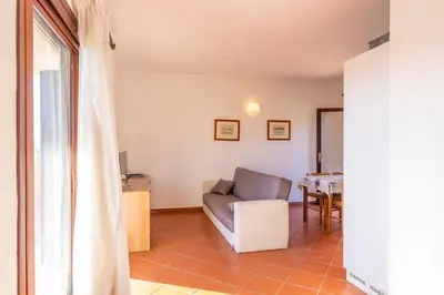 Area soggiorno di ISS Travel, L'Uddastru 2, Panoramic Apartments - with private outdoor terrace