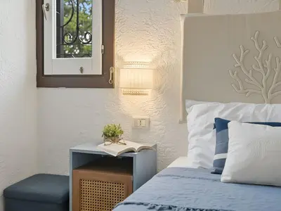 Letto o letti in una camera di Apartment Iris 5- Terza Spiaggia by Interhome