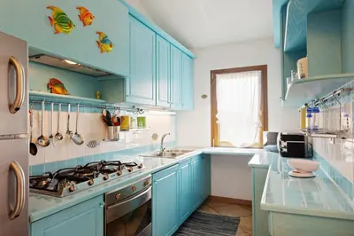 Cucina o angolo cottura di Sardegna è - Beach Apartment LE
