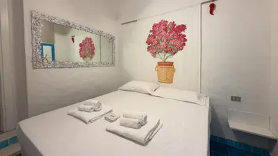 Letto o letti in una camera di Villa Cleopatra
