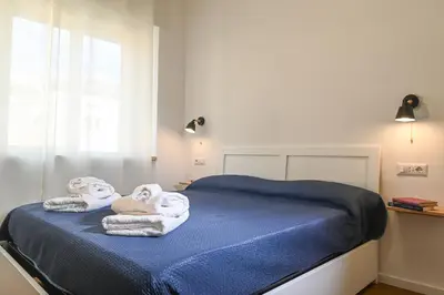 Letto o letti in una camera di My Holiday Olbia Rooms&Lounge by Rentbeat