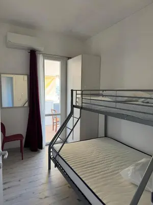 Letto o letti in una camera di Vista Tavolara