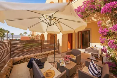 Balcone o terrazza di Residence Moresca , Appartamento Tavolara con Giardino e Vista Mare a 80 mt dalla Spiaggia