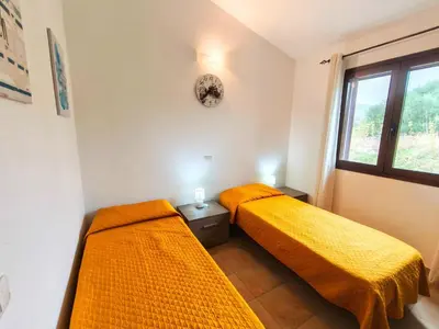 Letto o letti in una camera di Apartment near Budoni with a sea-view terrace