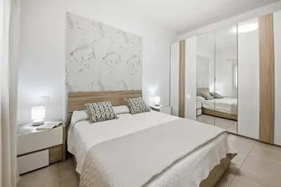 Letto o letti in una camera di Figarolo apartment by Residence Moresca