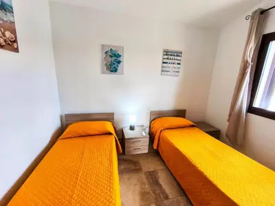 Letto o letti in una camera di Cosy apartment by sea near Budoni