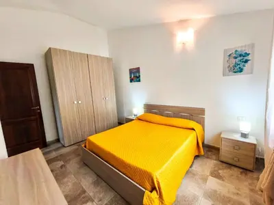 Letto o letti in una camera di Cosy apartment by sea near Budoni