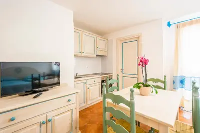 Cucina o angolo cottura di Appartamenti Baia Marina