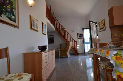 Cucina o angolo cottura di APT 800 METRI Spiaggia Agrustos 2 PAX