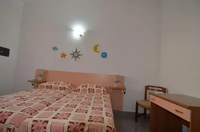 Letto o letti in una camera di FAGR-GAI014P Apt 800 mt spiaggia