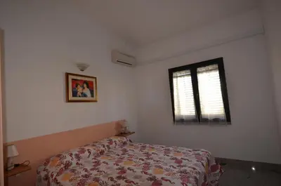 Letto o letti in una camera di FAGR-GAI014P Apt 800 mt spiaggia