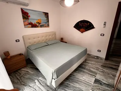 Letto o letti in una camera di Anto's House 2 bedroom Gulf View home with Jacuzzi