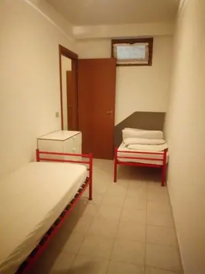Letto o letti in una camera di Appartamento Residence Giulia