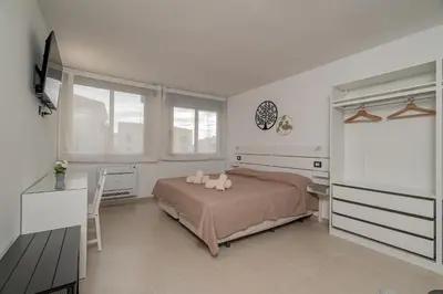 Letto o letti in una camera di Domo Archea, al centro di Olbia