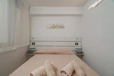 Letto o letti in una camera di Domo Archea, al centro di Olbia
