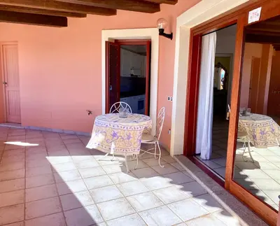 Balcone o terrazza di ISA - Luxury apartment Ginepro sea view with common swimming pool just 50 mt from the beach
