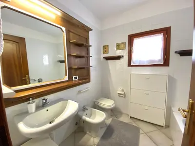 Bagno di ISA - Luxury apartment Ginepro sea view with common swimming pool just 50 mt from the beach
