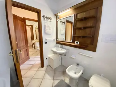 Bagno di ISA - Luxury apartment Ginepro sea view with common swimming pool just 50 mt from the beach