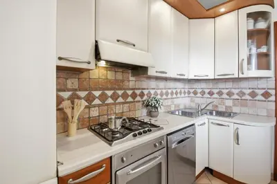 Cucina o angolo cottura di Molara apartment by Residence Moresca, frontemare