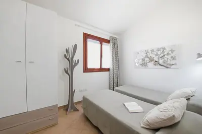 Letto o letti in una camera di Monte Ruju Apartment by Residence Moresca